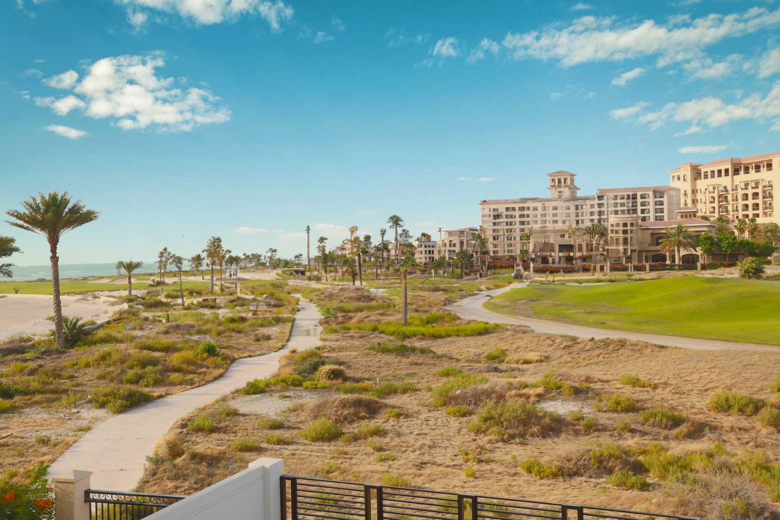Aerial view of Jawaher Saadiyat on Saadiyat Island, Abu Dhabi, showcasing the exclusive gated community, beachfront residences, and premium island living.